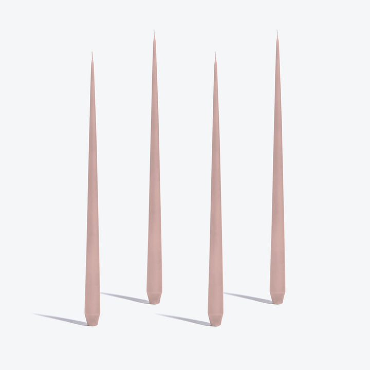Tapered Candle, Set of 4 — four tall Rose candles standing upright on a white background