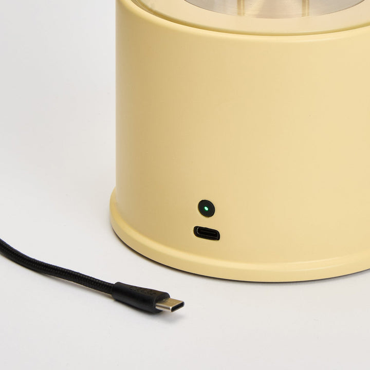 The Muse 2.0 Portable Lamp in Posset Yellow