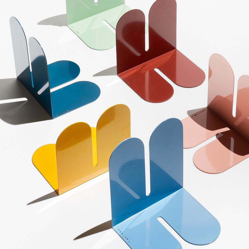 Tortuga sculptural metal bookends in colorful powder-coated finishes, modern design