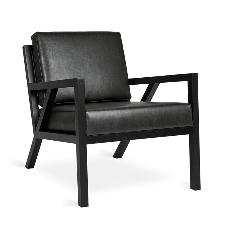 Black leather armchair with geometric oak frame, modern designer lounge chair