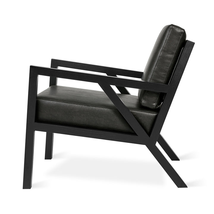 Black leather armchair with geometric wood frame, modern designer furniture