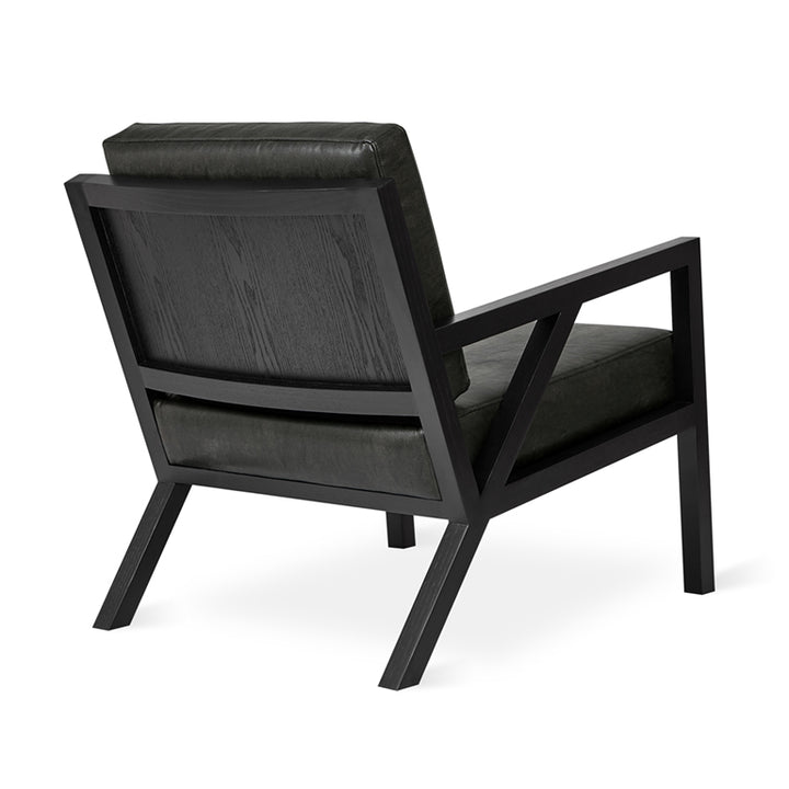 Black leather armchair with dark wood frame, modern designer lounge chair