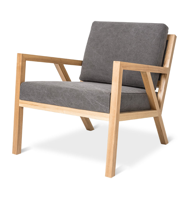 Modern armchair with oak frame and charcoal linen upholstery, minimalist design