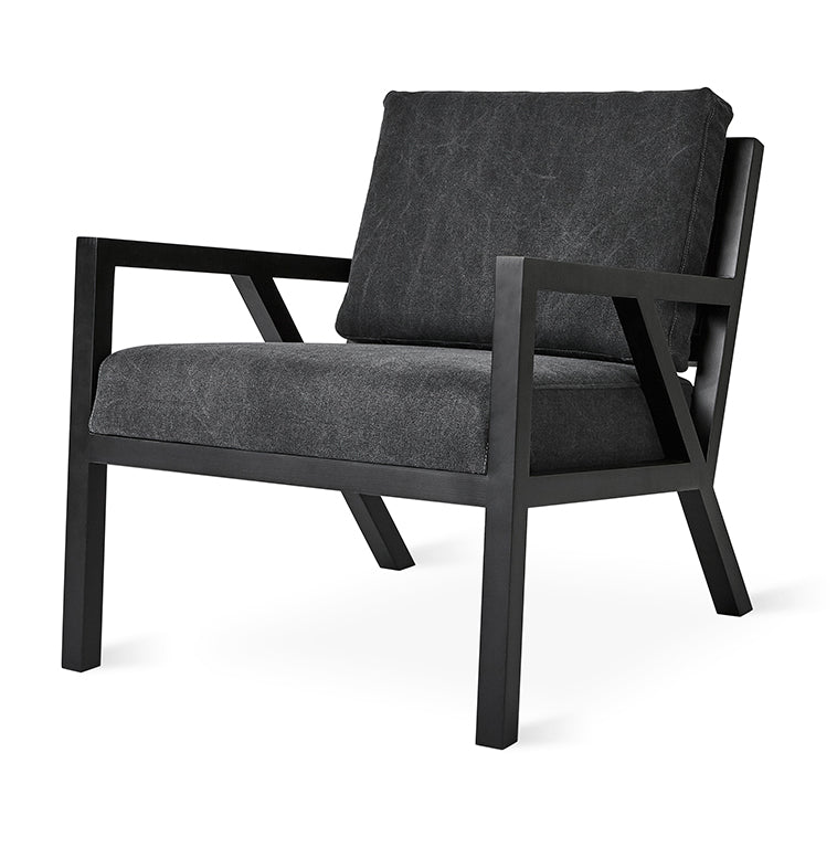 Modern black armchair with textured fabric and sleek wooden frame