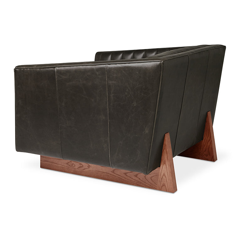 Dark leather armchair with walnut wood base, modern designer furniture