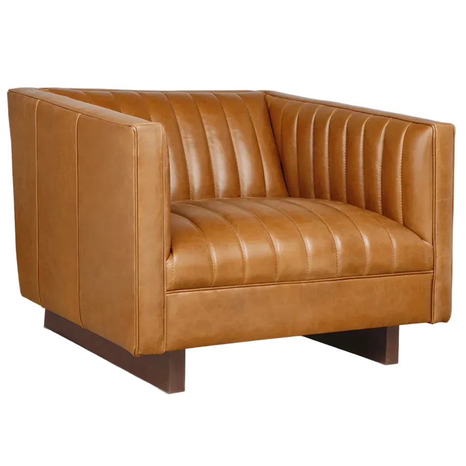 Caramel leather armchair with vertical channel tufting and dark wood base