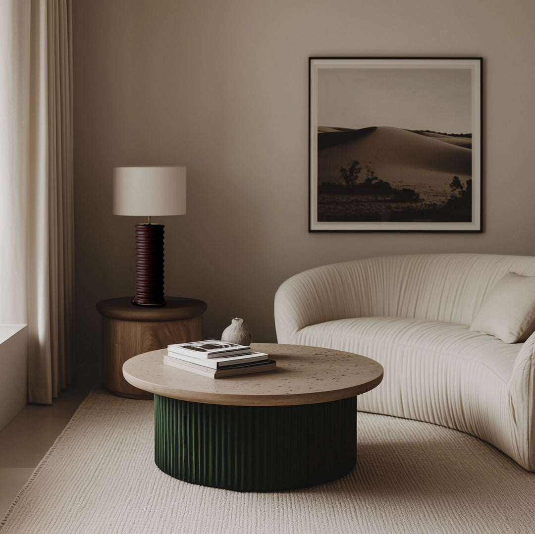 Taro Table Lamp with dark burgundy ribbed base and white shade on a wood side table in a neutral living room