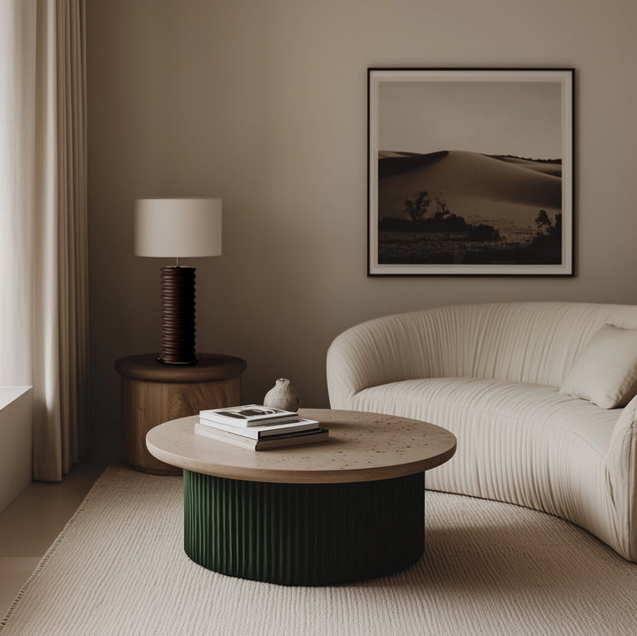 Taro Table Lamp with dark burgundy ribbed base and white shade on a wood side table in a neutral living room