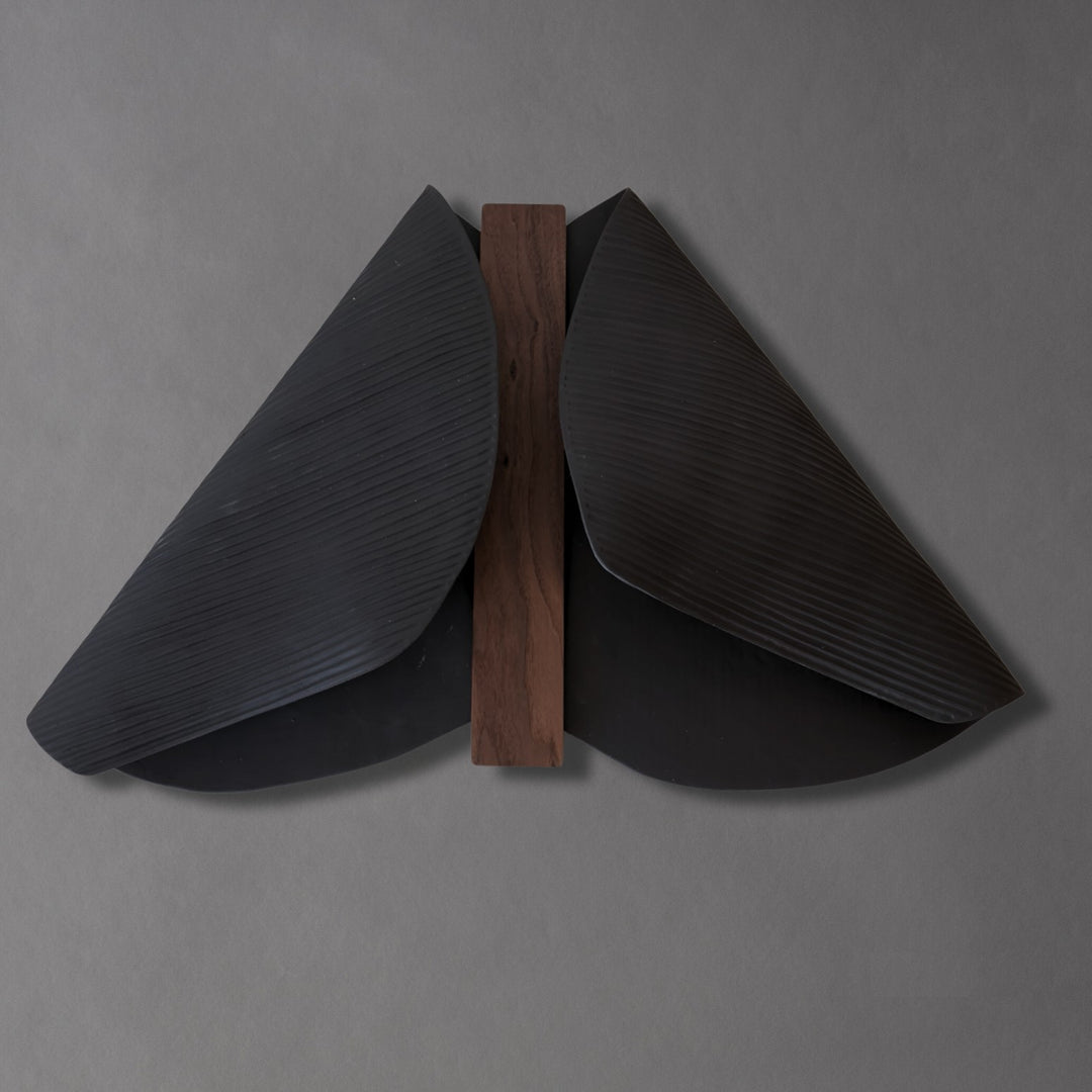 Abundance Duo II wall sculpture, two ribbed black stoneware wings around a walnut spine