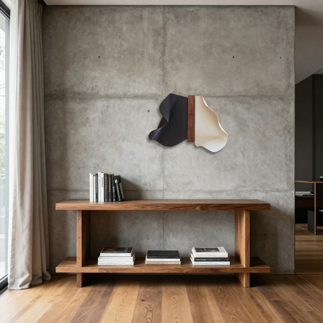 Abundance Small in walnut, white and black stoneware above a wooden console on a concrete wall