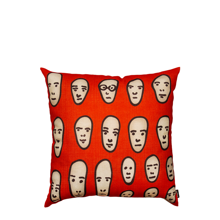 Faces on Red Cushion
