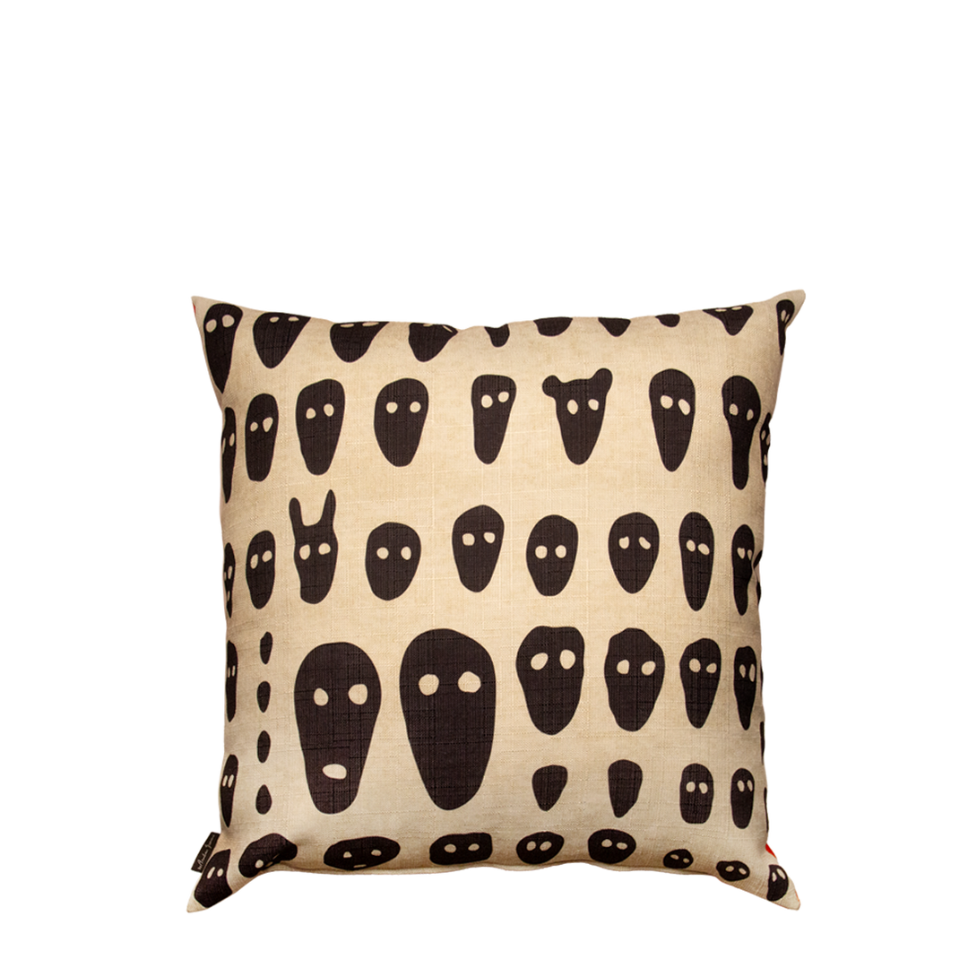 Faces on Red Cushion