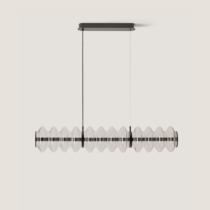 Vitree Linear Pendant in Matt Black, ribbed clear glass cylinder on a slim black canopy, unlit, by Aromas del Campo
