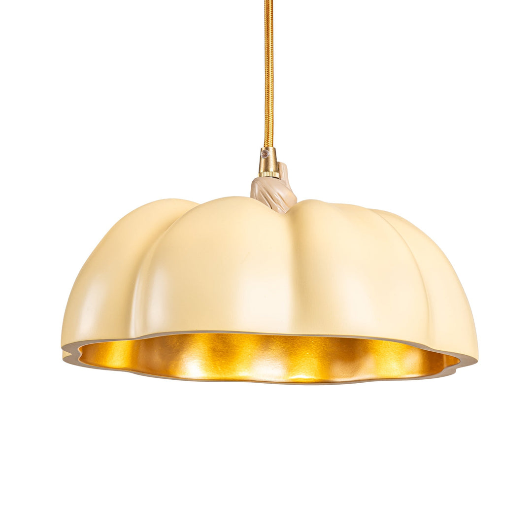 Seletti Vitamin Pumpkin 1 Pendant Lamp, the pumpkin pendant glowing warm from below
