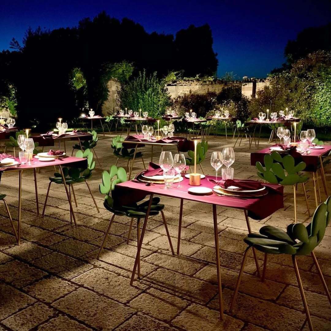 Filicudi chair by Marcantonio, powder-coated metal and polyethene, in a refined outdoor dining setting