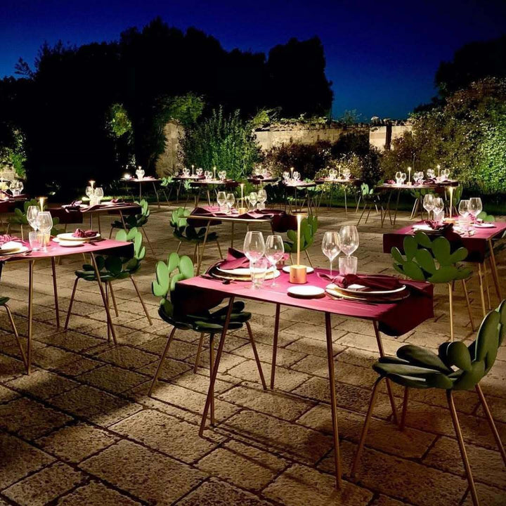Filicudi chair by Marcantonio, powder-coated metal and polyethene, in a refined outdoor dining setting
