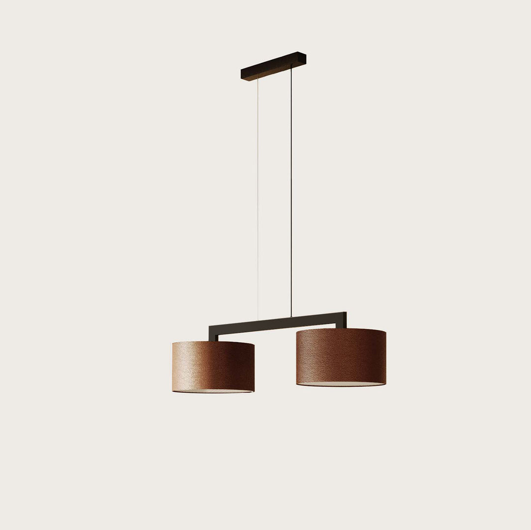 Rems Pendant Double, two brown leather drum shades on an offset black bar, by Aromas del Campo