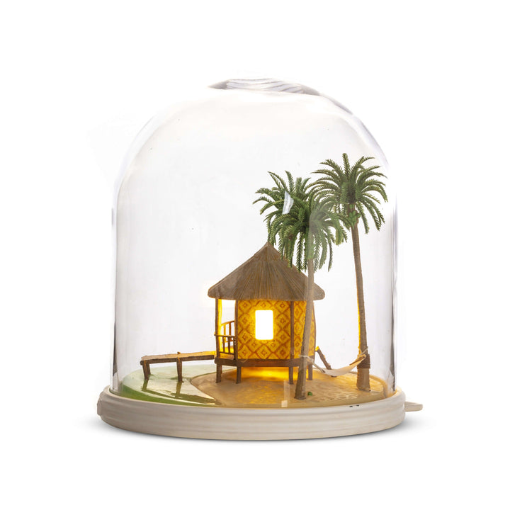 Seletti My Little Holiday, side view of the beach hut and jetty, lit
