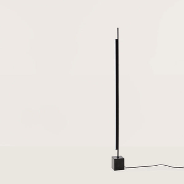 Coln Floor Lamp in matt black with black marble block base and floor cable, full-height view