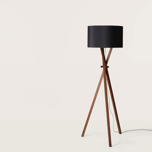 Cot Floor Lamp in Matt Black shade on crossed walnut tripod legs, unlit, front view